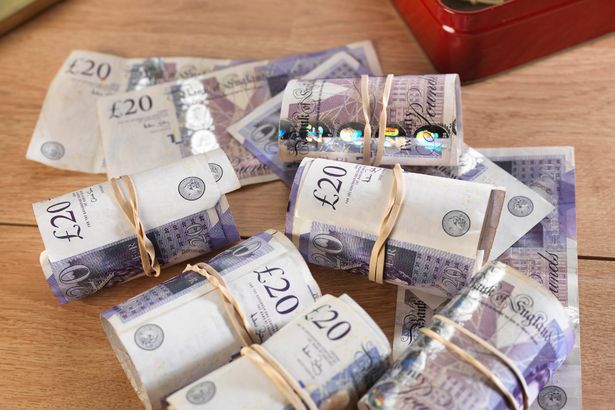 Cash-savings-in-biscuit-tin